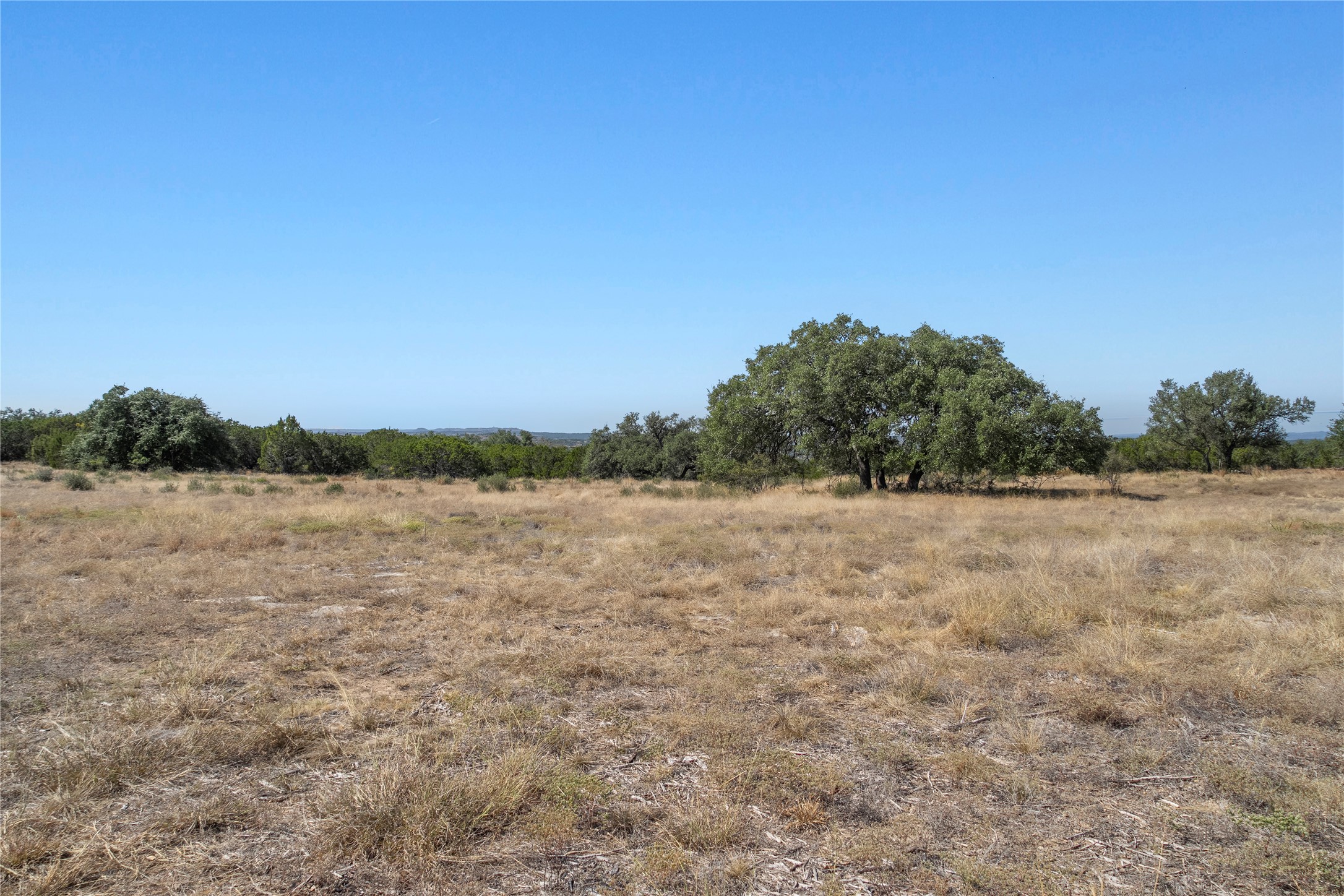 219 Canyon Road Johnson City, TX 78636 - Photo 9 of 9 a view of lake and mountain