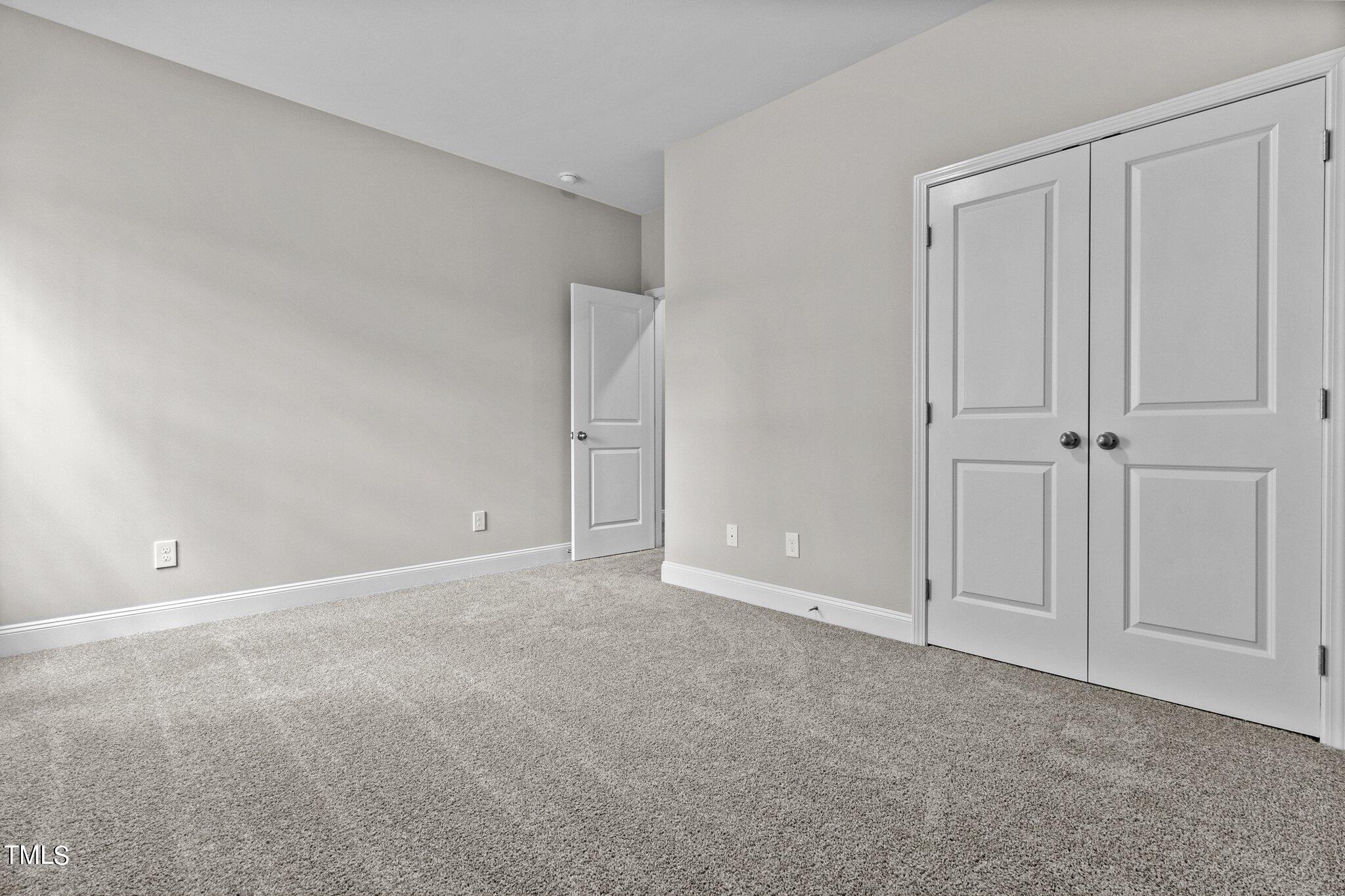 111 Regis Lane Coats, NC 27521 - Photo 20 of 36 a view of an empty room