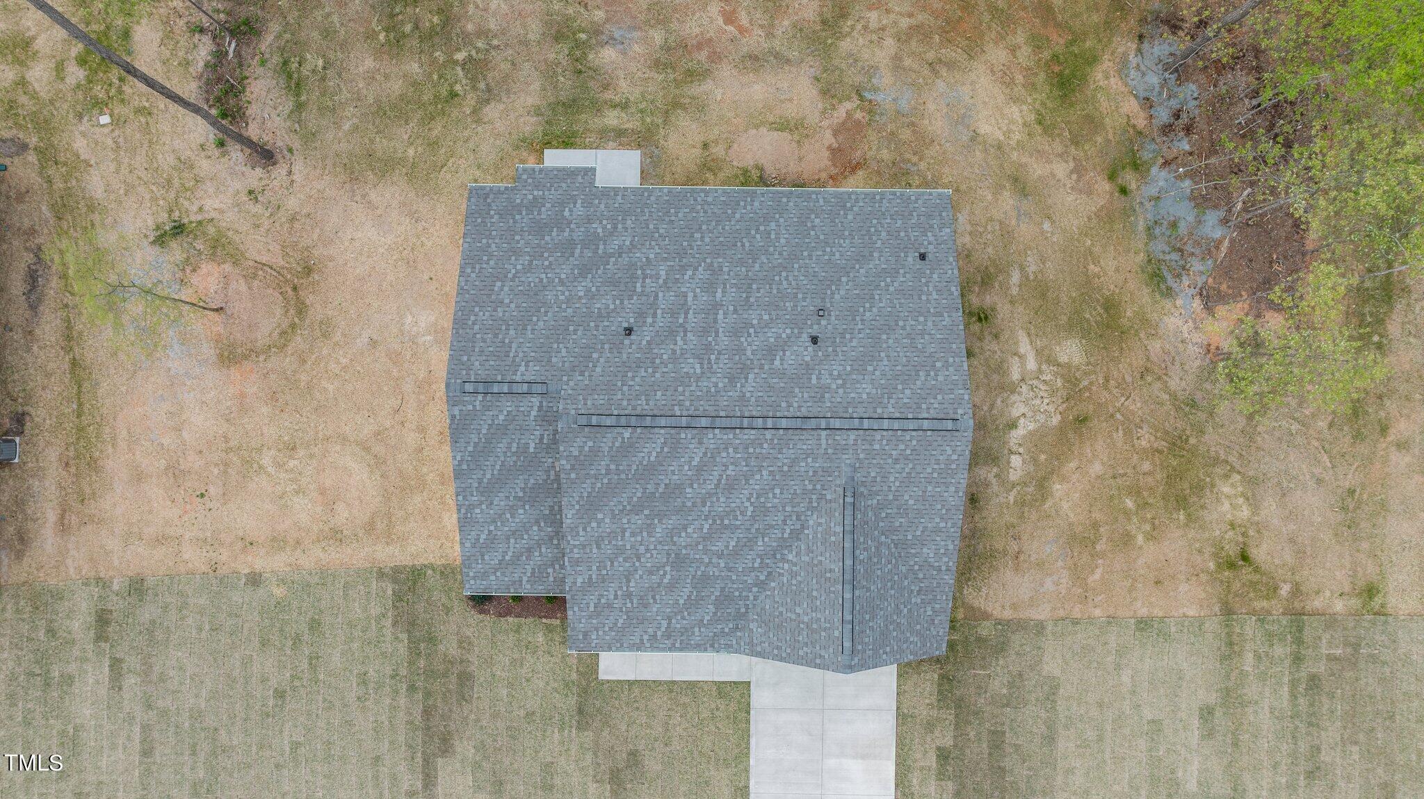 111 Regis Lane Coats, NC 27521 - Photo 2 of 36 a bathroom with a shower