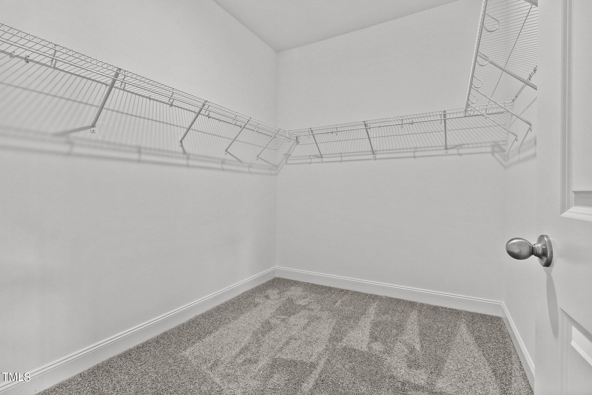 111 Regis Lane Coats, NC 27521 - Photo 25 of 36 a view of a room with racks on the wall