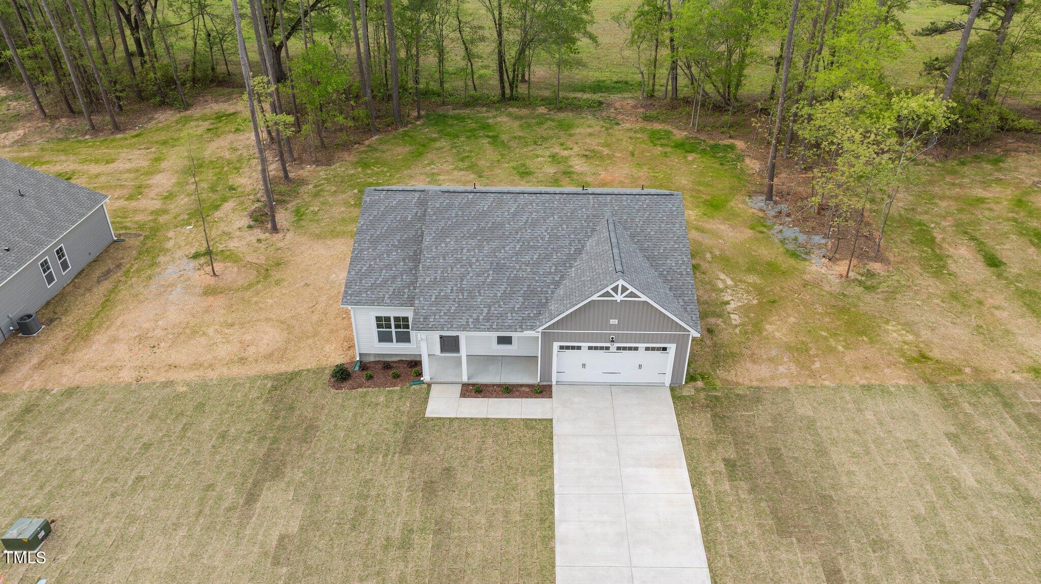 111 Regis Lane Coats, NC 27521 - Photo 30 of 36 a bathroom with a sink
