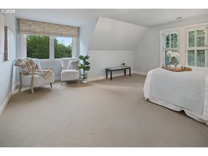 a living room with furniture and window