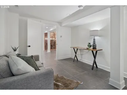 a bedroom with a bed and a table