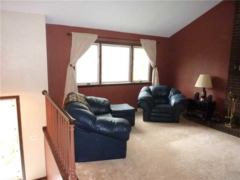 362 Denny Road Valencia, PA 16059 - Photo 4 of 19 Living Room. A large window allows plenty of light to flow into this room surrounded in warm tones.
