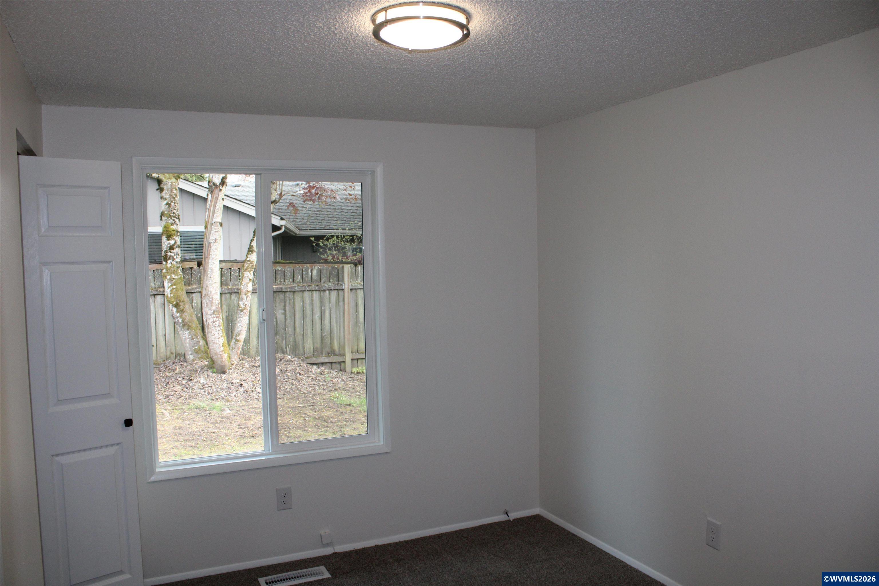 6259 Chapman Place Southwest Albany, OR 97321 - Photo 14 of 21 an empty room with a window