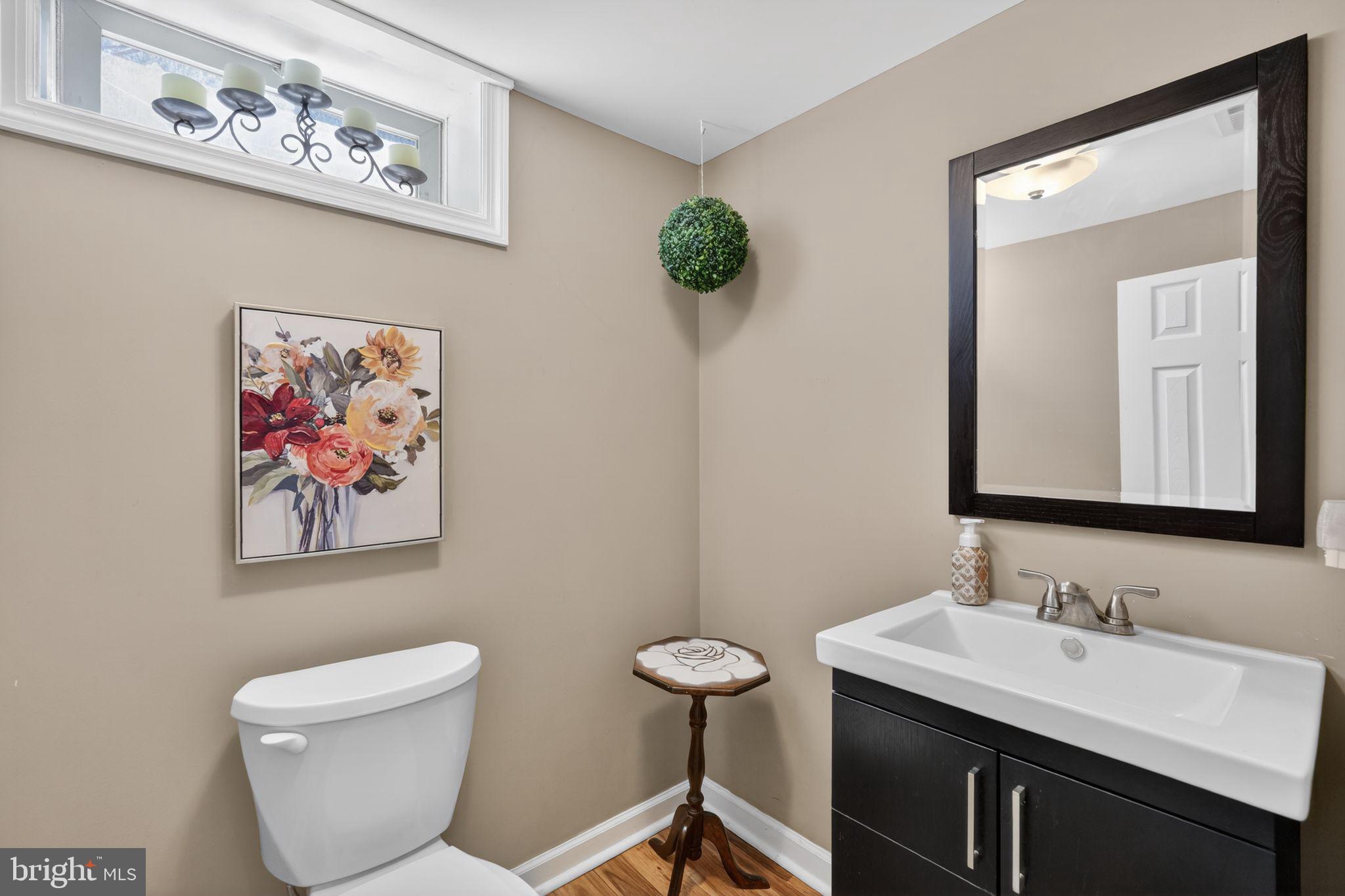 226 Potomac Road Wilmington, DE 19803 - Photo 21 of 29 Chic half-bath with floral accents.