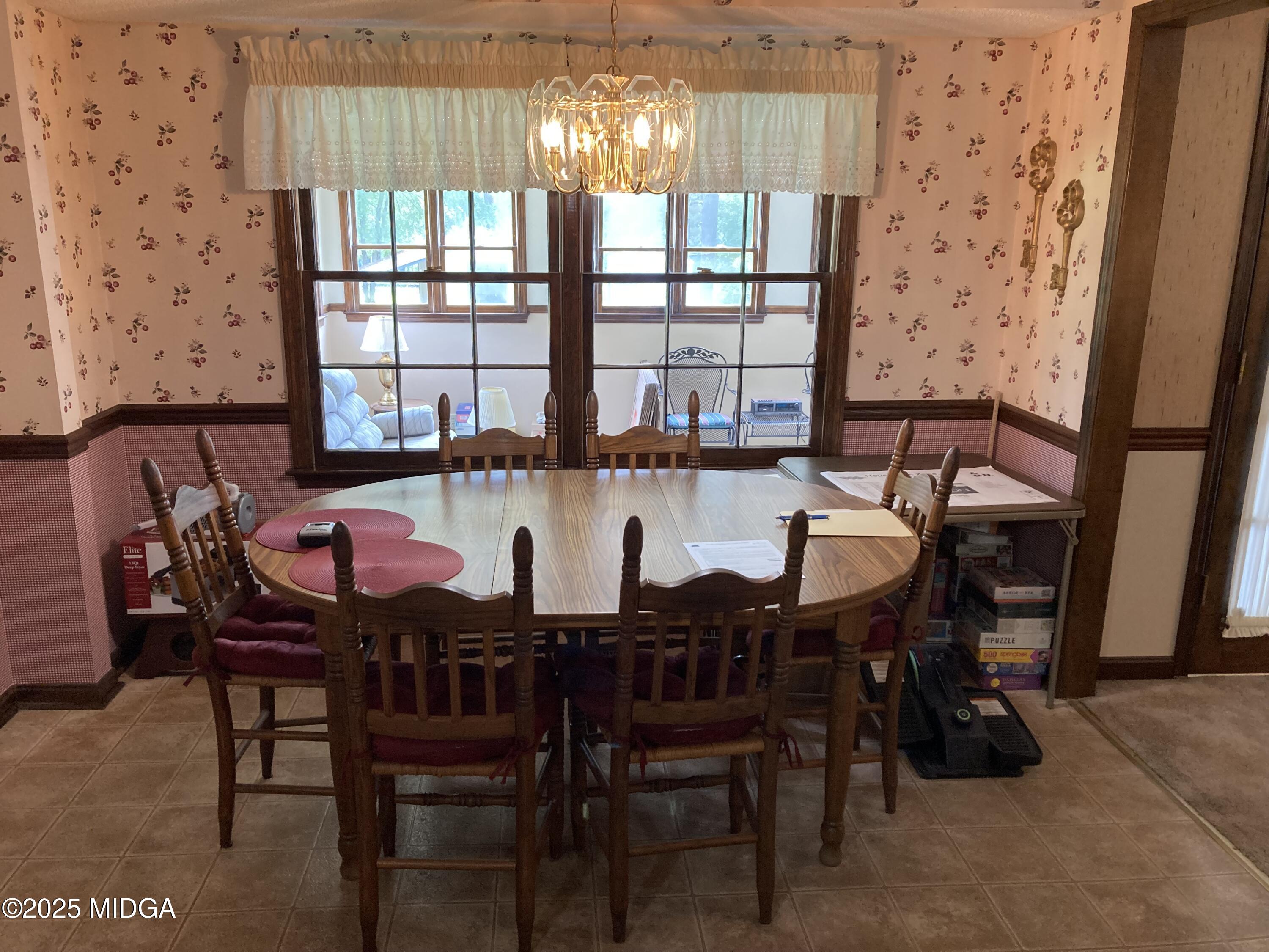 6236 Stapleton Road Macon, GA 31206 - Photo 15 of 47 a view of a dining room with furniture and window