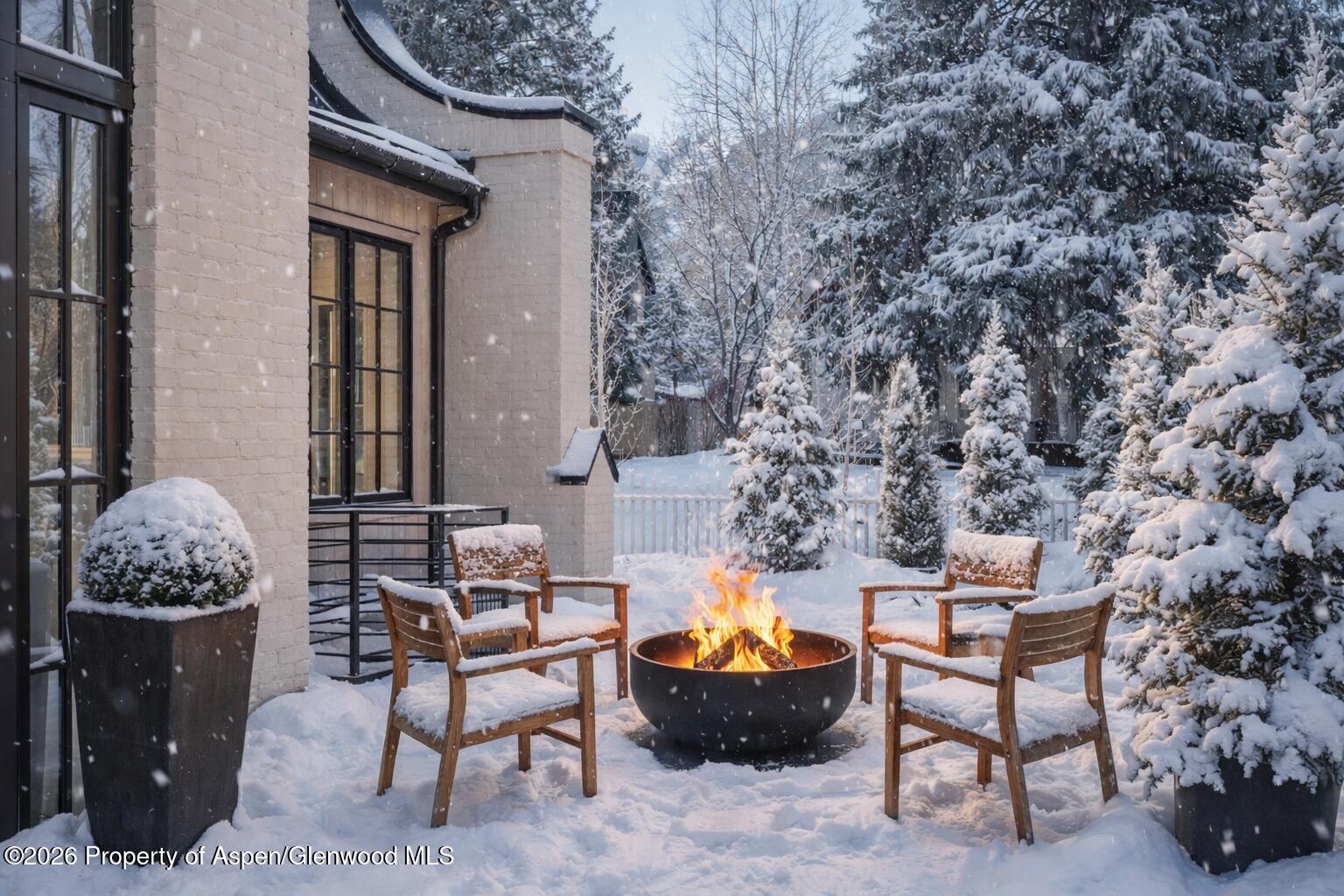 502 North 6th Street Aspen, CO 81611 - Photo 5 of 17 a outdoor living space with furniture and a fireplace