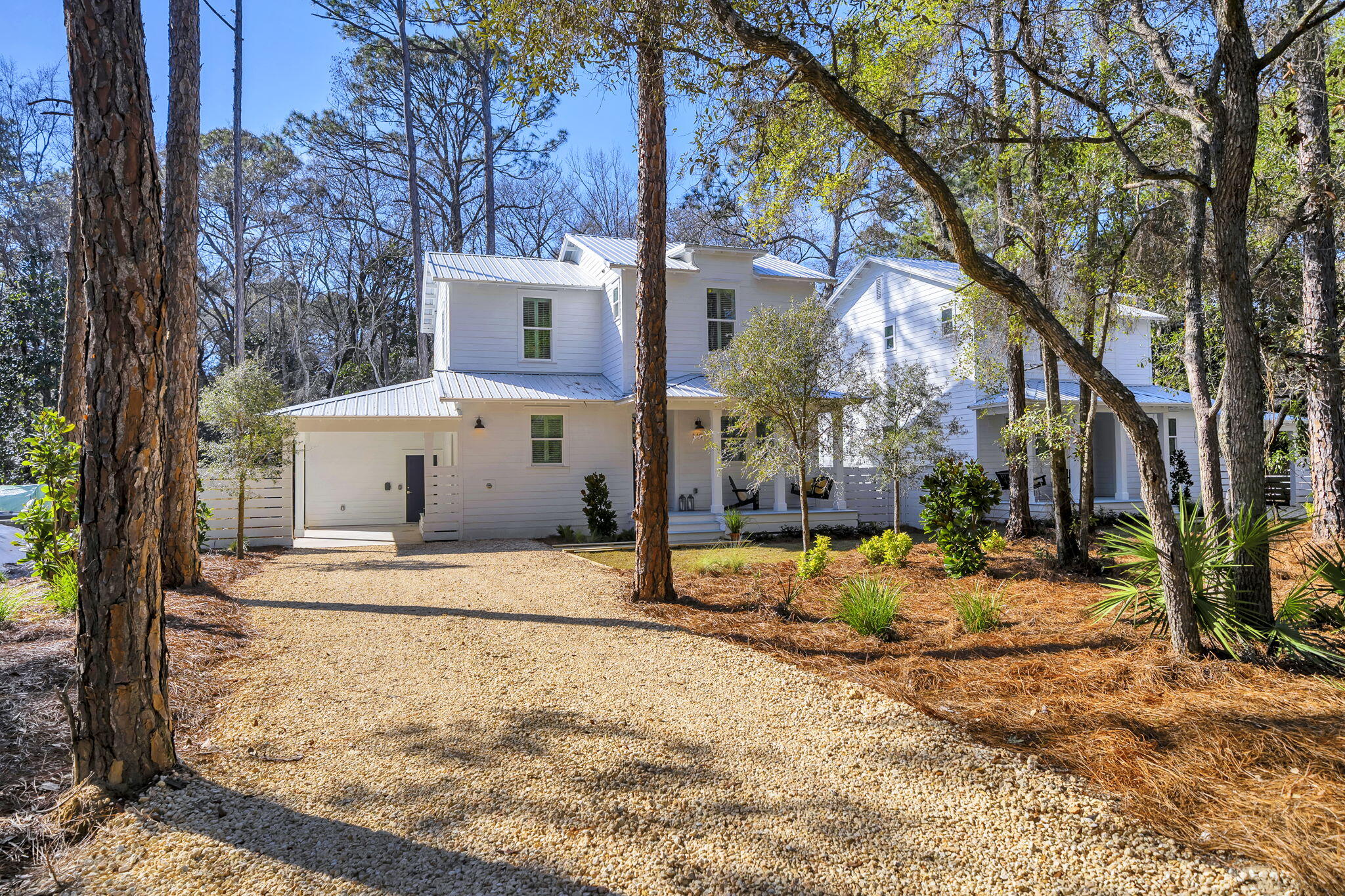 119 Osprey Lane Santa Rosa Beach, FL 32459 - Photo 2 of 35 a view of a house with snow on the road