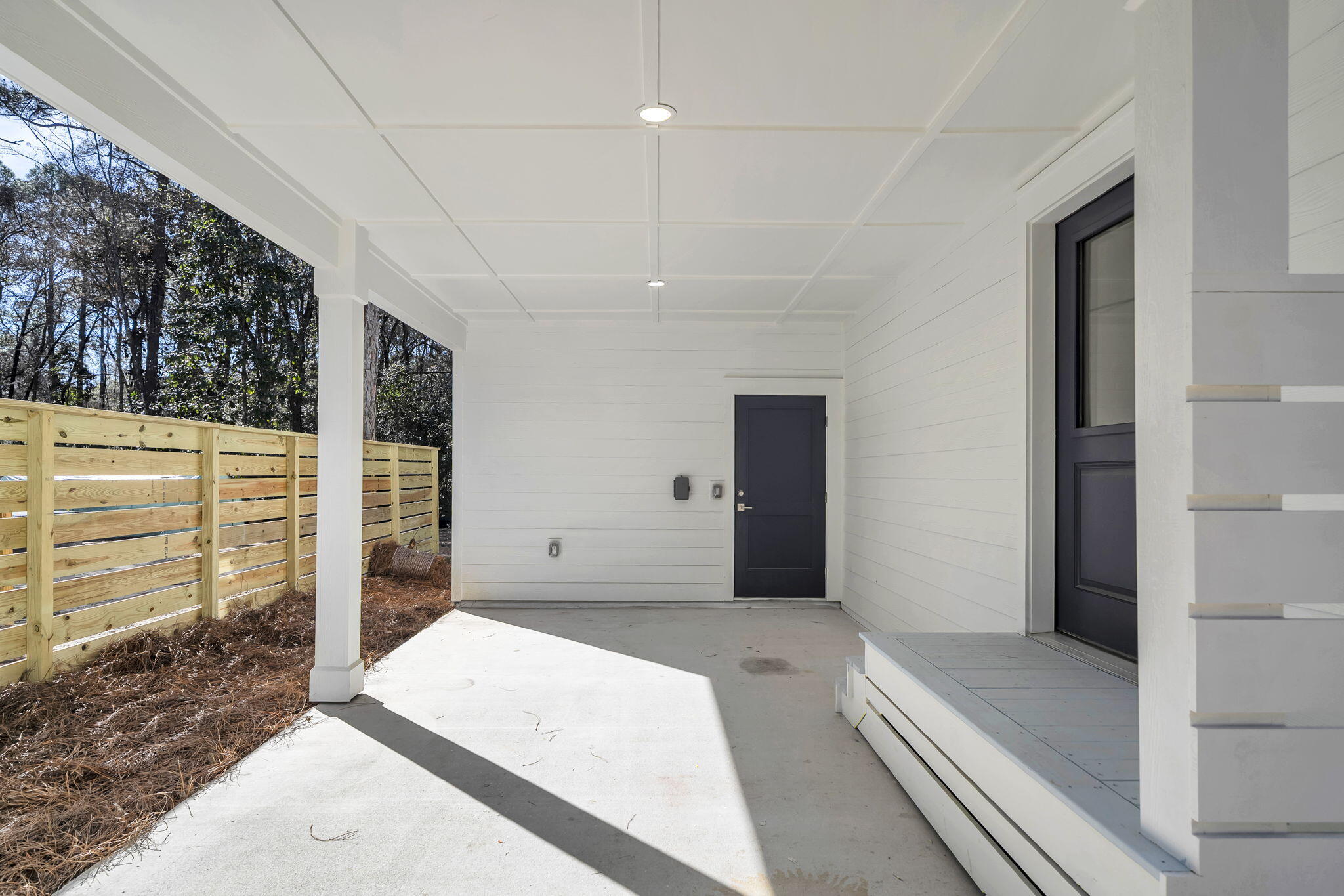 119 Osprey Lane Santa Rosa Beach, FL 32459 - Photo 5 of 35 a spacious bedroom with a large bed and a chandelier