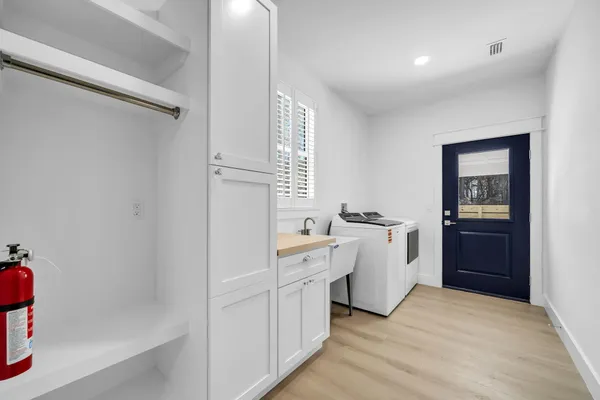 a view of a kitchen with a sink