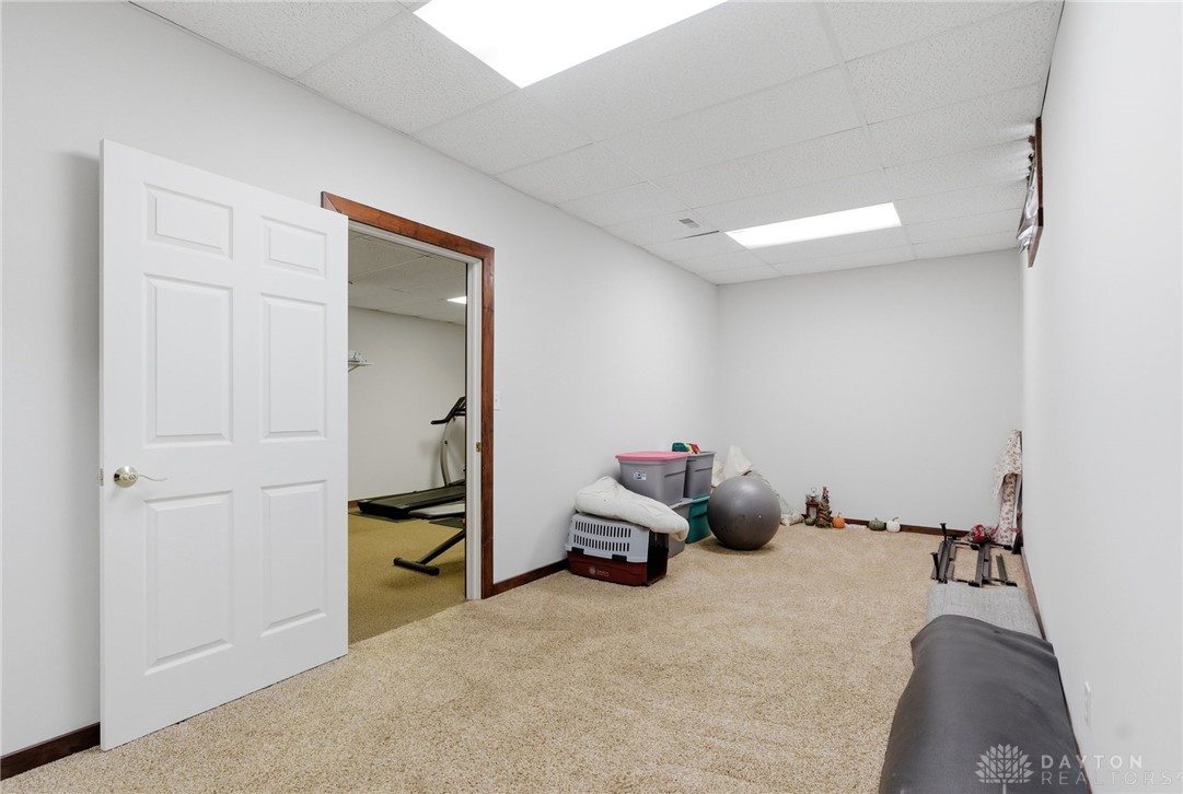 1540 Jasper Road Xenia, OH 45385 - Photo 57 of 91 This versatile room with carpet flooring offers comfort and functionality for various uses.