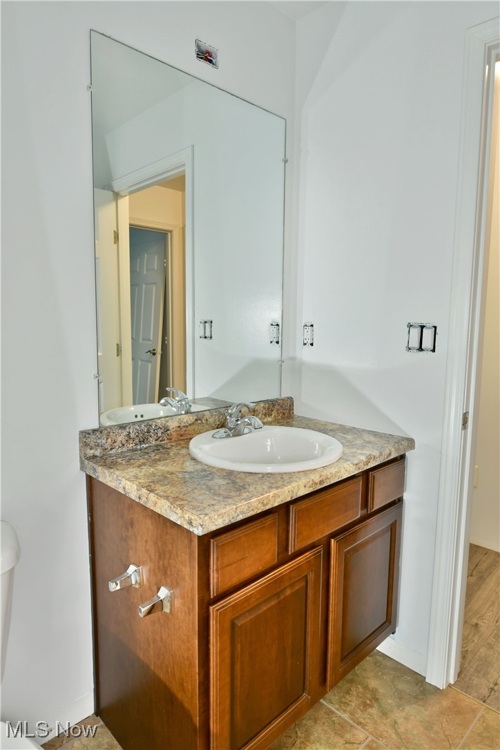 6005 Hurlburt Road Rome, OH 44085 - Photo 23 of 50 Bathroom featuring vanity