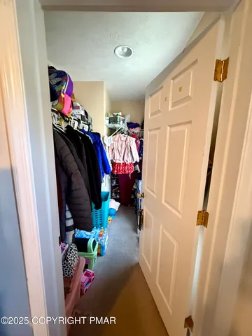 a view of a entryway with furniture and toys