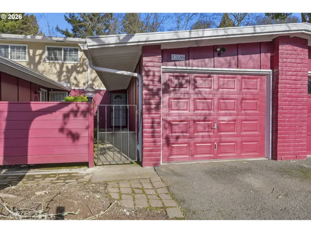 a front view of a building with glass windows