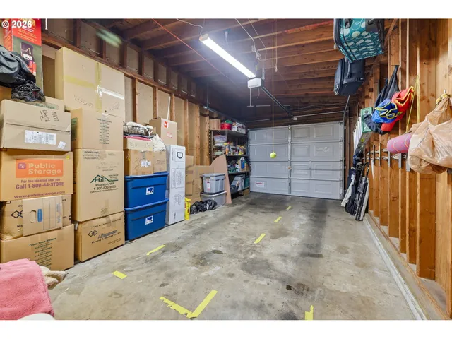 a wooden bench sitting in the middle of a yard