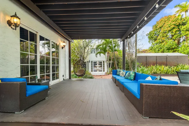 a backyard of a house with lots of green space and trees
