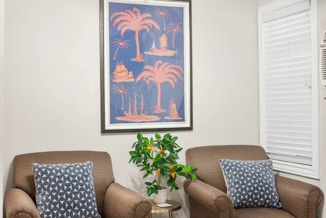 a view of a bedroom with a window