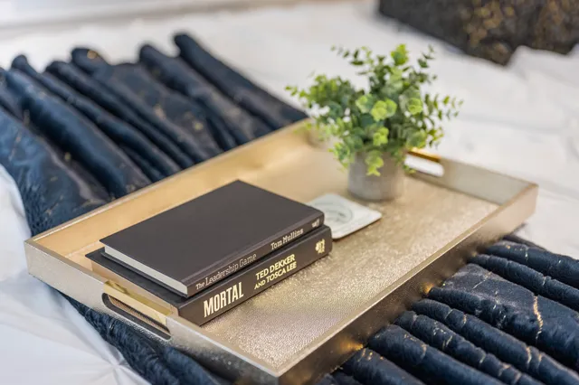 a living room with furniture and a table