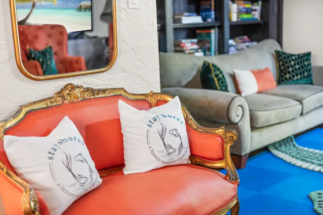 a building outdoor space with patio furniture and garden