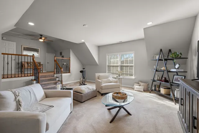 a building outdoor space with patio furniture and potted plants