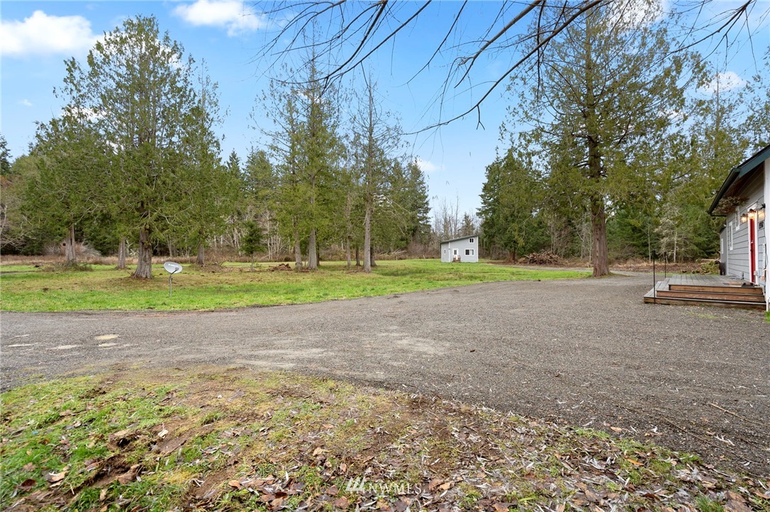 15542 Runyon Road Southeast Rainier, WA 98576 - Photo 22 of 23 a view of outdoor space with playground and green space