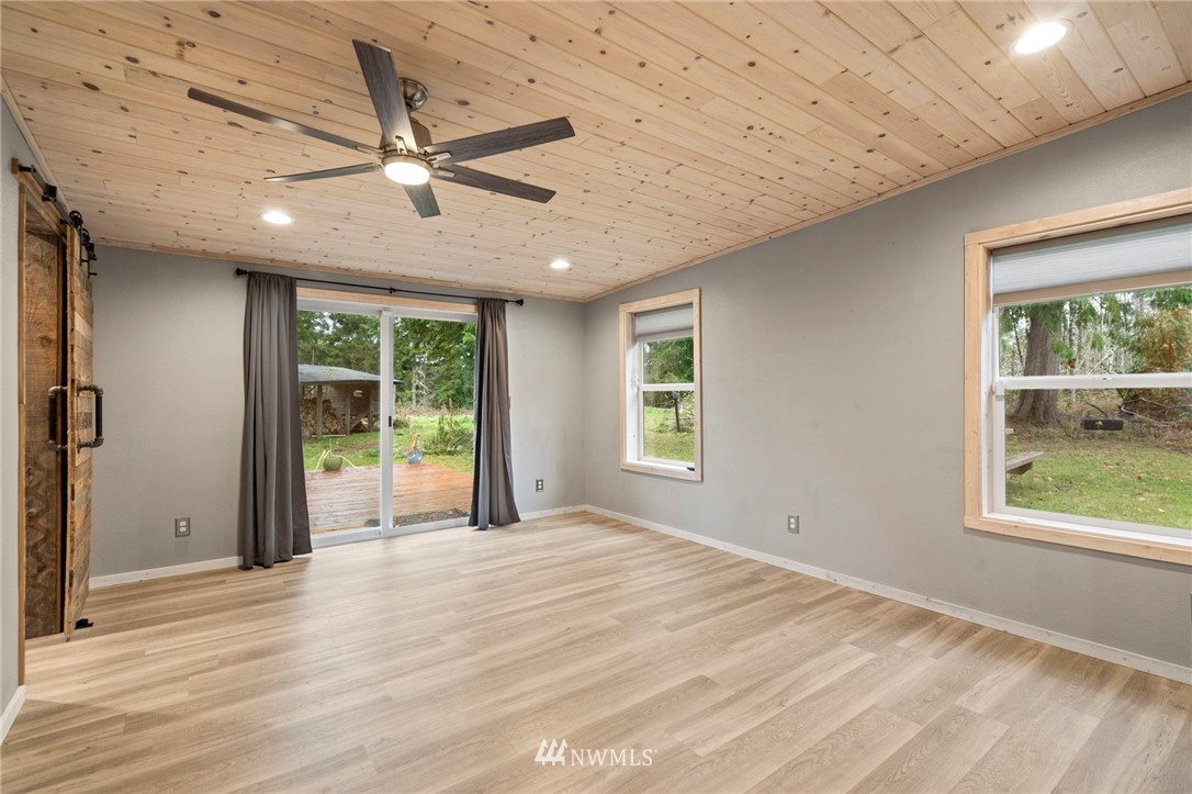 15542 Runyon Road Southeast Rainier, WA 98576 - Photo 8 of 23 a view of an empty room with a window
