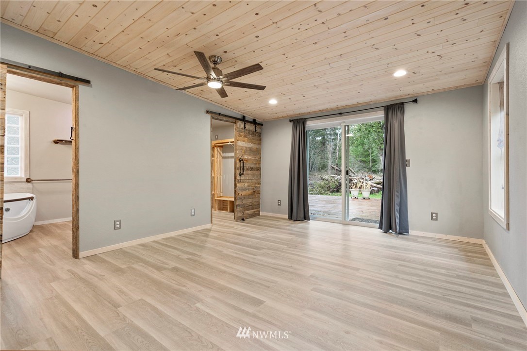 15542 Runyon Road Southeast Rainier, WA 98576 - Photo 9 of 23 a view of an empty room with a window