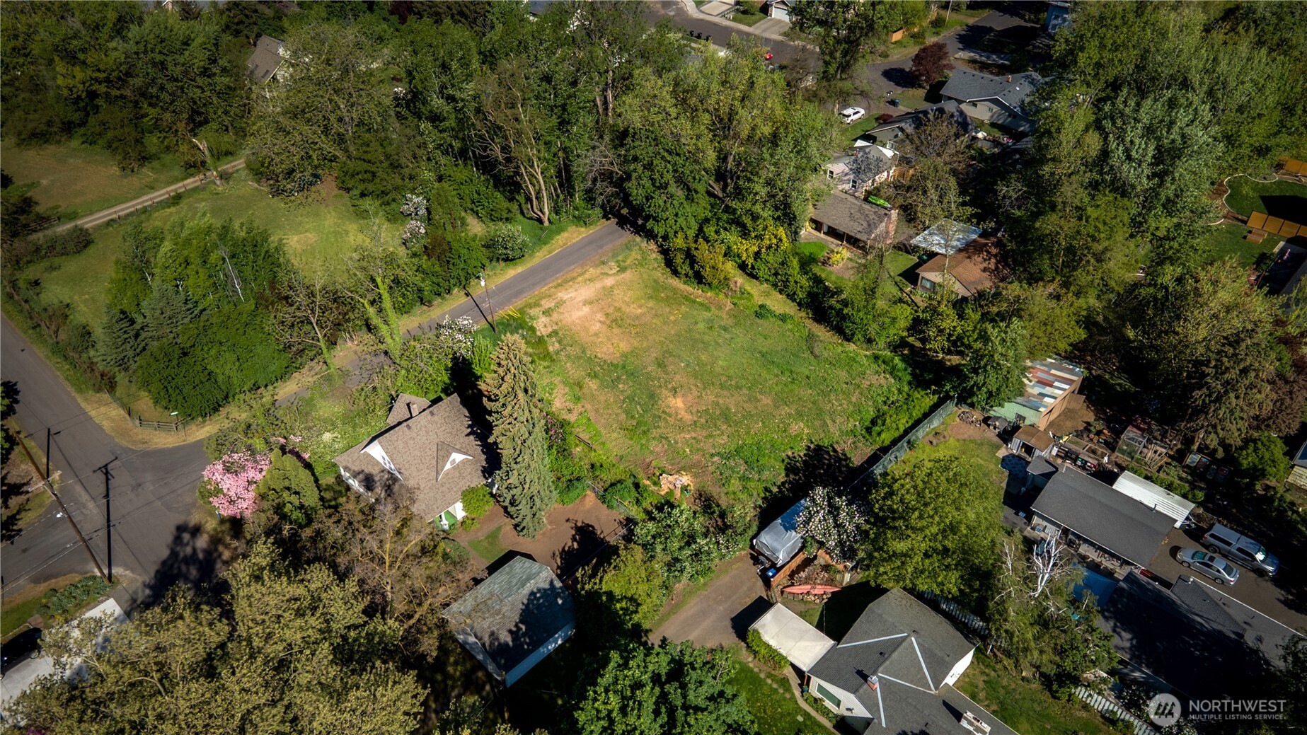 1031 Woodlawn Street Walla Walla, WA 99362 - Photo 3 of 7 an aerial view of residential houses with outdoor space