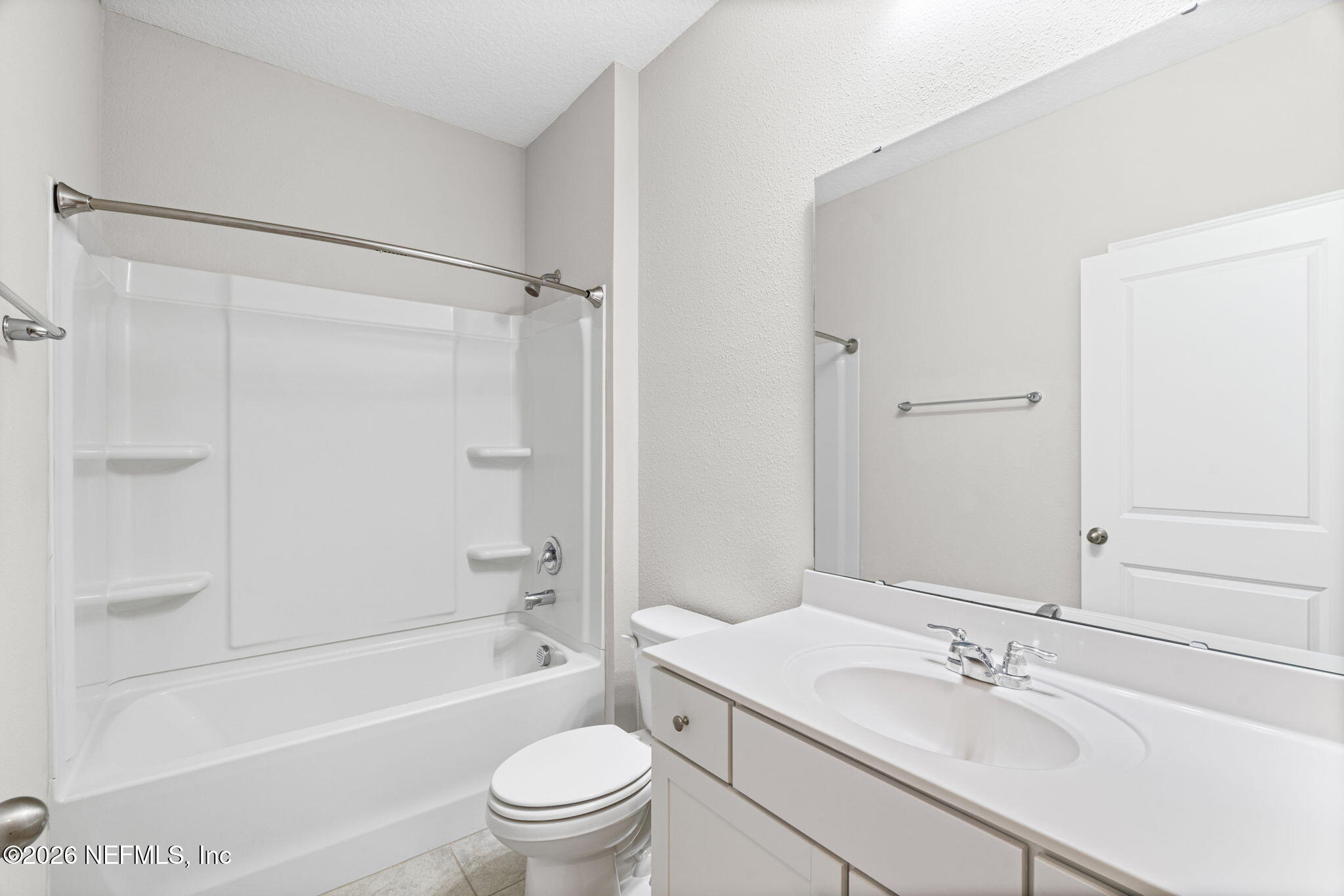 75209 Chelsea Gdn Way Yulee, FL 32097 - Photo 18 of 33 a bathroom with a sink a toilet and shower