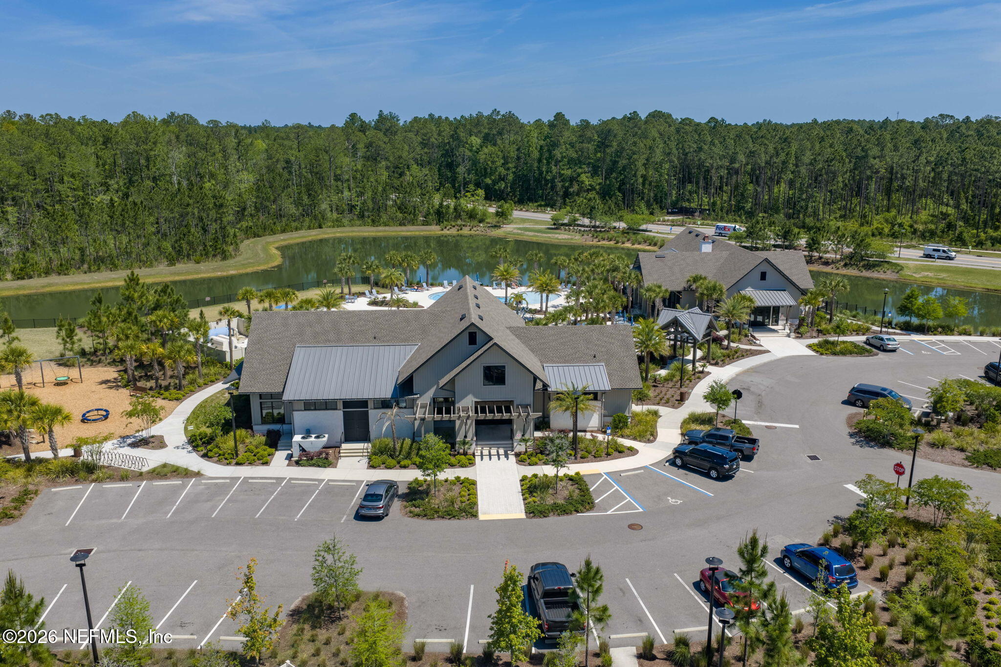 75209 Chelsea Gdn Way Yulee, FL 32097 - Photo 29 of 33 an aerial view of a house with garden space and outdoor seating