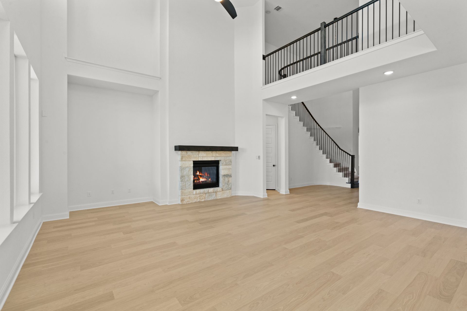 497 Wood Thrush Run Kyle, TX 78640 - Photo 14 of 35 Family Room with soaring ceiling & fireplace