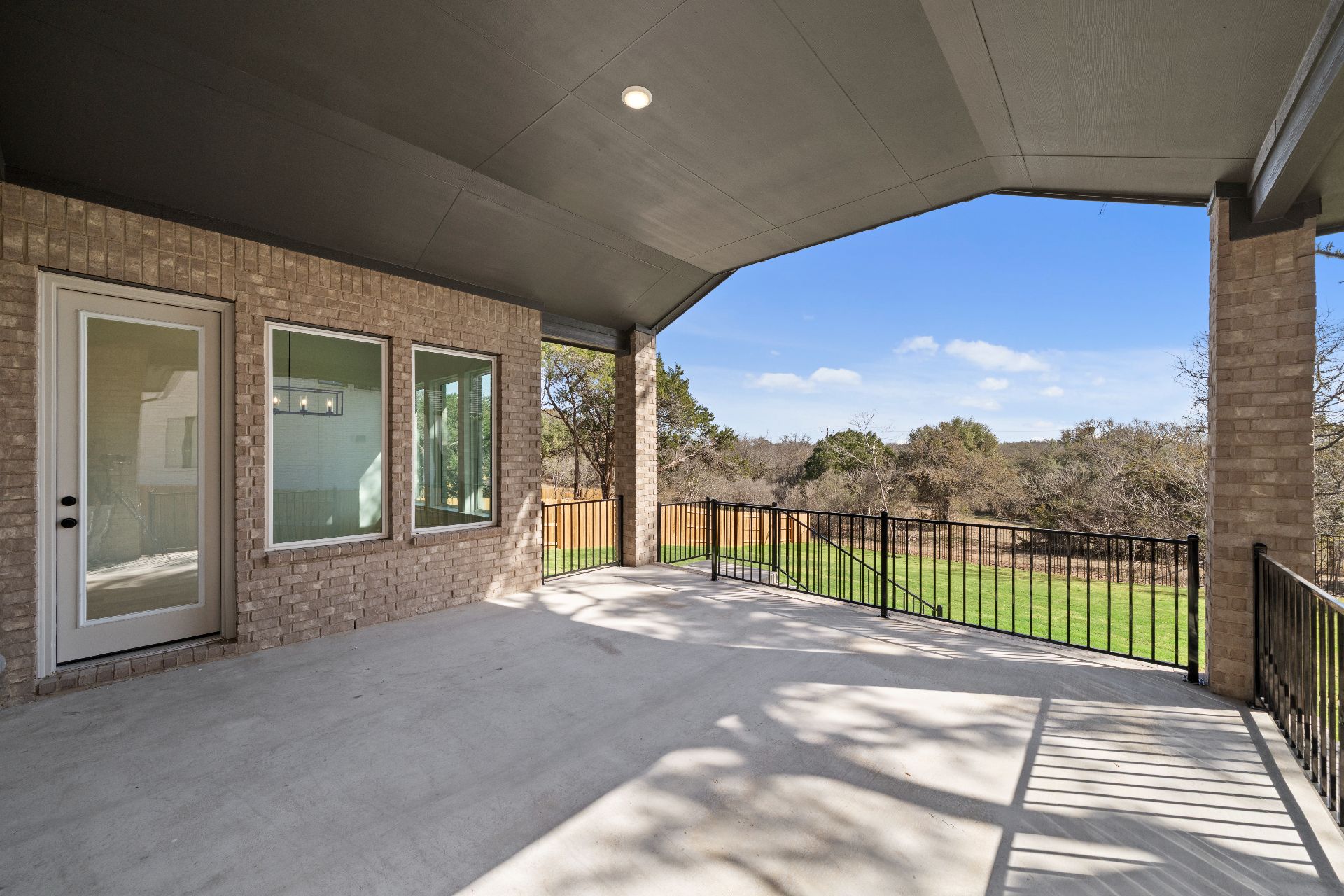 497 Wood Thrush Run Kyle, TX 78640 - Photo 26 of 35 Large Rear Covered Patio