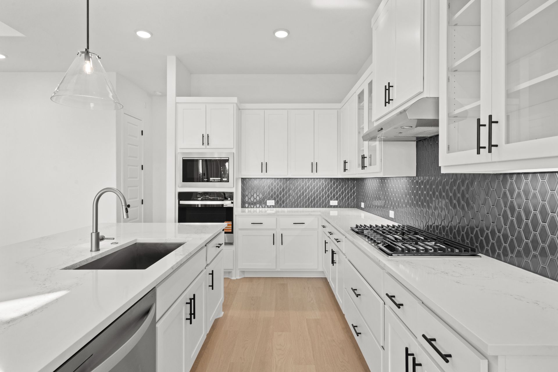 497 Wood Thrush Run Kyle, TX 78640 - Photo 9 of 35 Stunning finishes in Light & Bright Kitchen