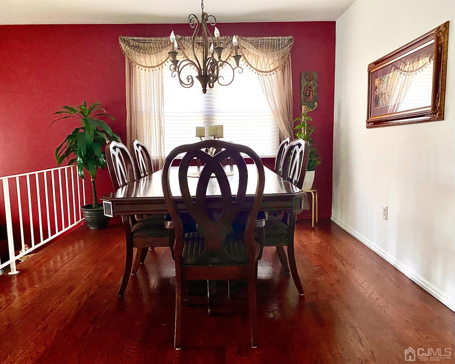 201 Normandy Road Edison, NJ 08820 - Photo 3 of 3 a view of a dining room with furniture window and wooden floor
