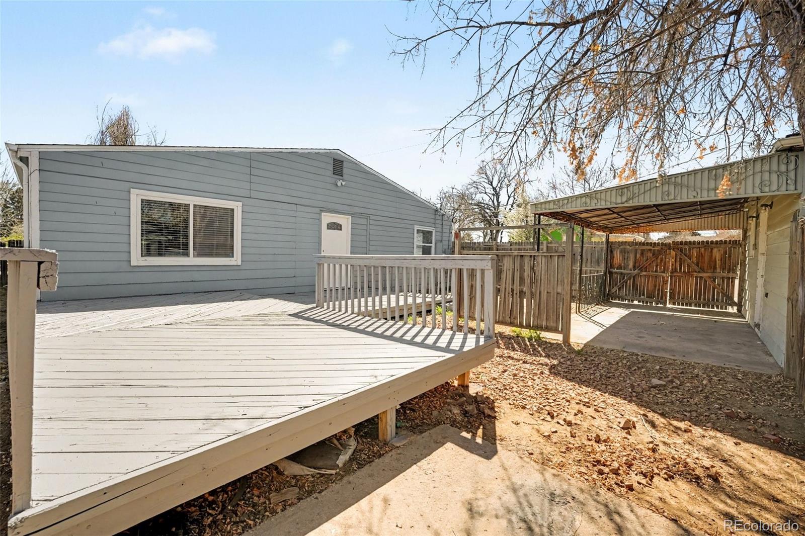 1701 Ironton Street Aurora, CO 80010 - Photo 19 of 23 a pathway of a house