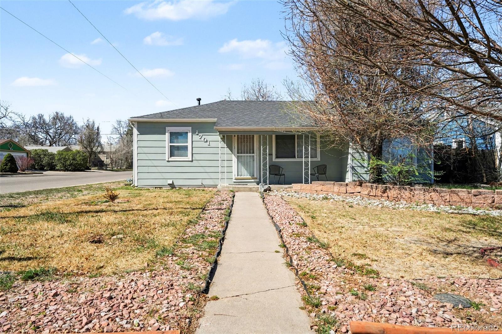 1701 Ironton Street Aurora, CO 80010 - Photo 2 of 23 a house with swimming pool in front of it