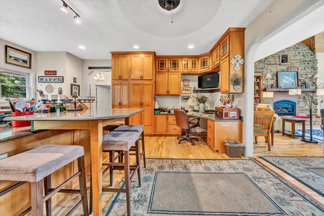 a bed room with furniture and a large window