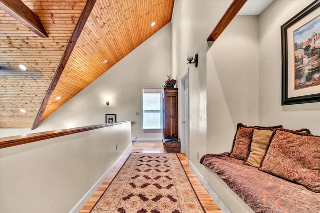 a bed room with a bed and a dresser