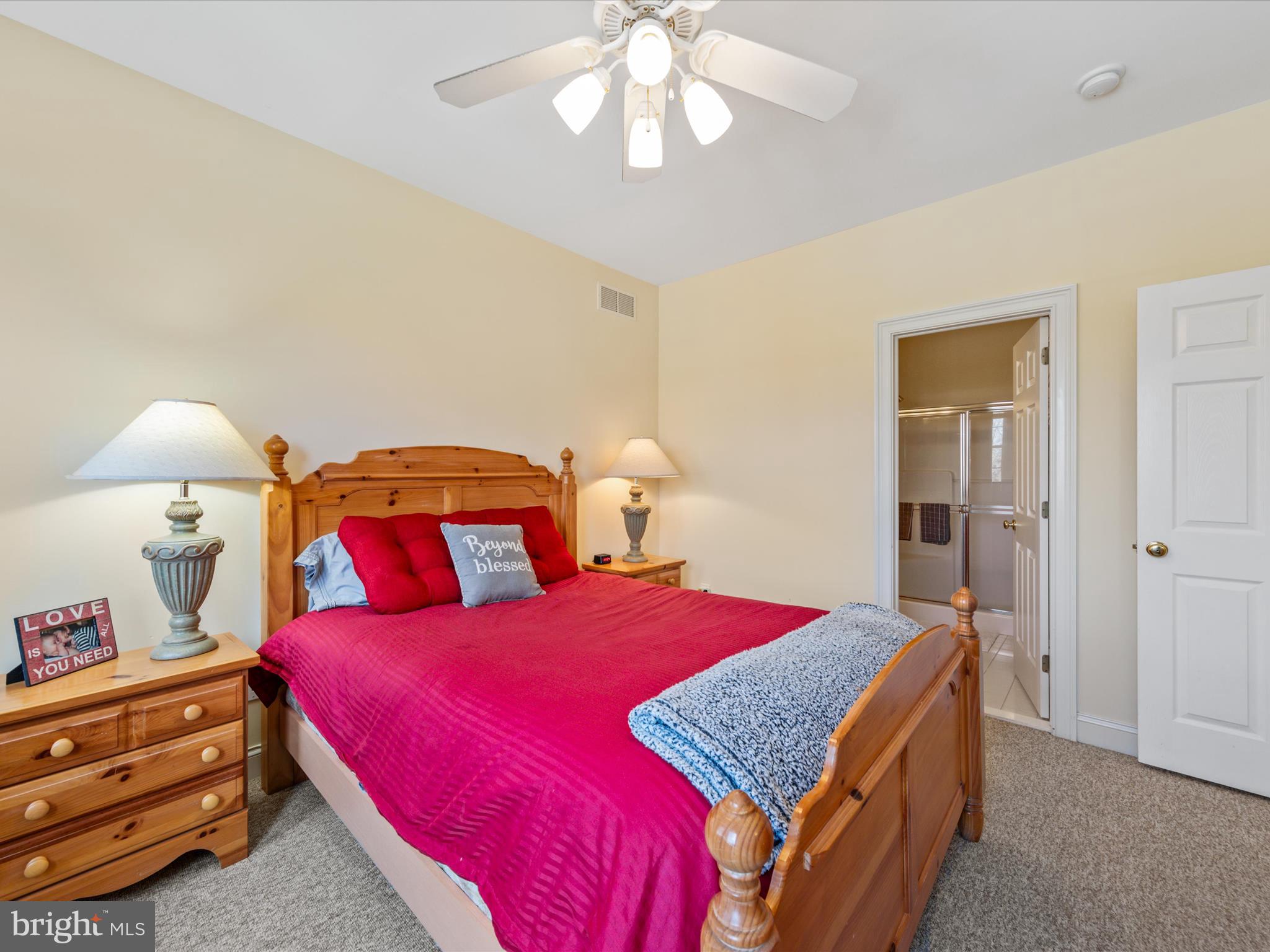 16 Wills Way, Unit 48 Rehoboth Beach, DE 19971 - Photo 27 of 49 Main level bedroom with ensuite