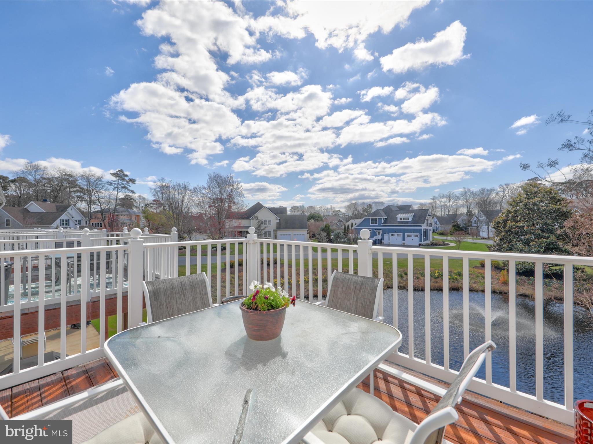 16 Wills Way, Unit 48 Rehoboth Beach, DE 19971 - Photo 39 of 49 Main level deck overlooking pond