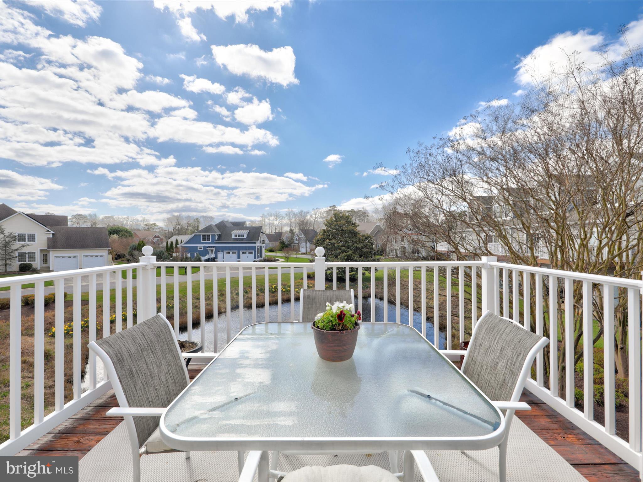 16 Wills Way, Unit 48 Rehoboth Beach, DE 19971 - Photo 40 of 49 Main level deck overlooking pond