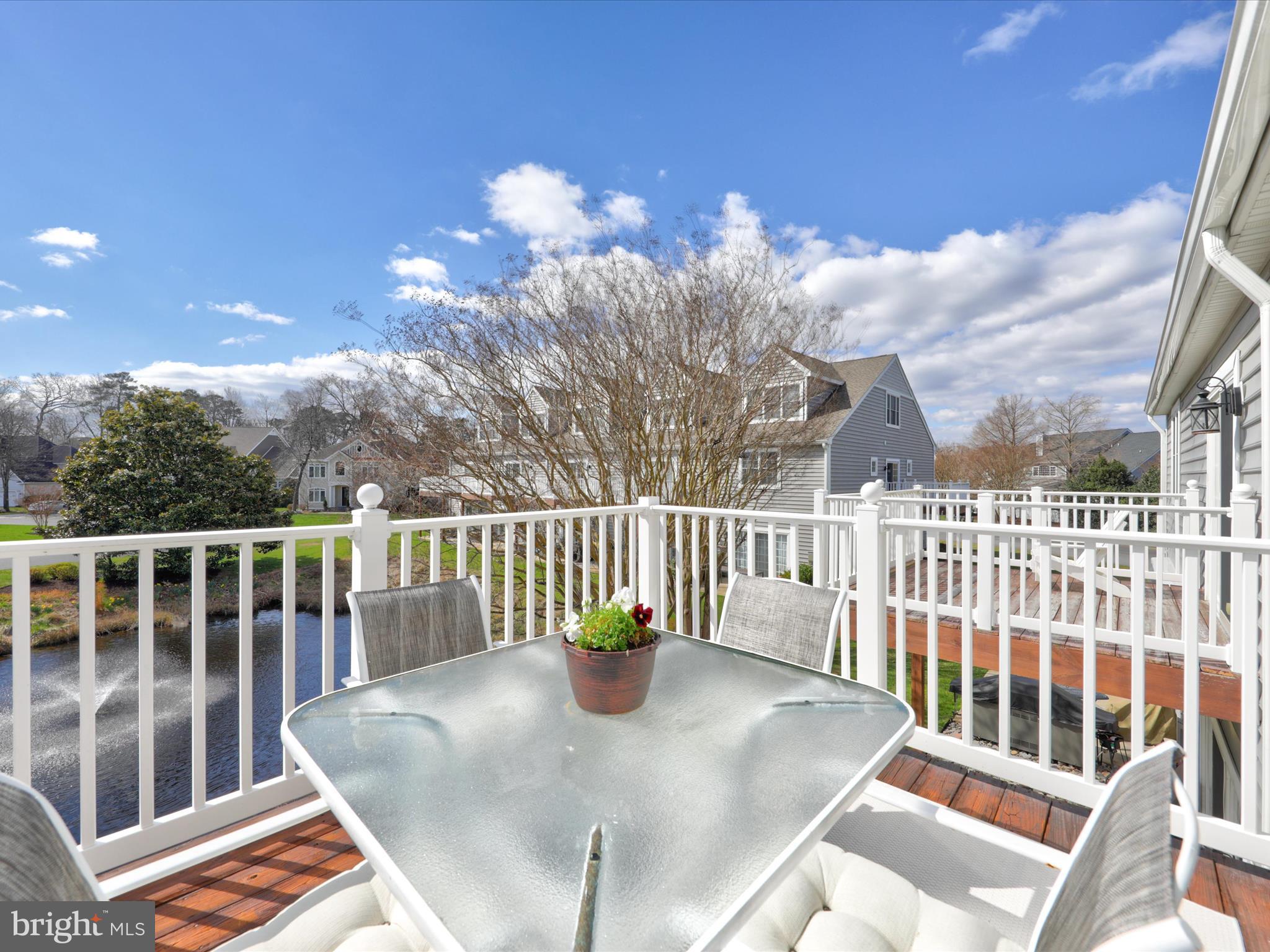16 Wills Way, Unit 48 Rehoboth Beach, DE 19971 - Photo 41 of 49 Main level deck overlooking pond