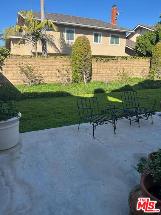 5259 West Goldenwood Drive Inglewood, CA 90302 - Photo 7 of 9 a view of backyard with outdoor seating and green space