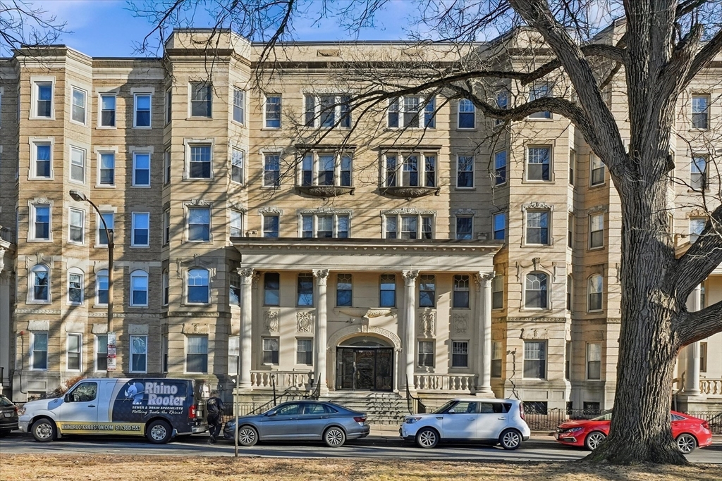 70 Fenway, Unit 51 Boston, MA 02115 - Photo 2 of 24 a front view of a residential apartment building with a yard