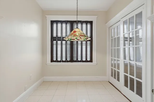 a kitchen with stainless steel appliances a refrigerator and a stove top oven