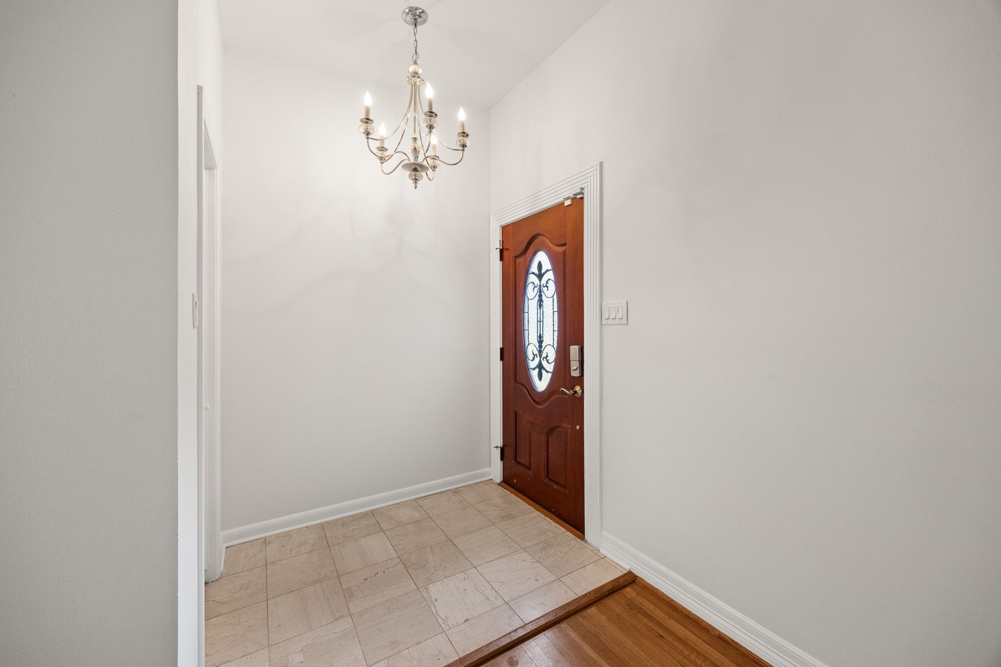 10310 Mayfield Road Houston, TX 77043 - Photo 10 of 49 Foyer opens to living room