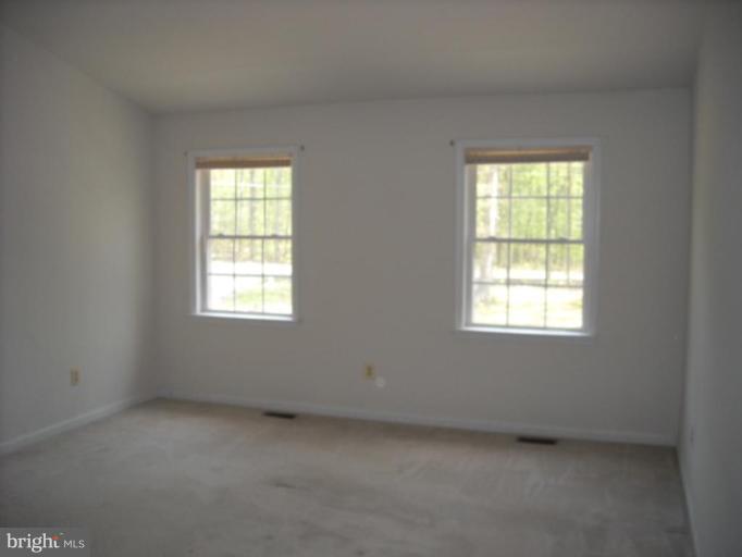12390 Tacketts Mill Road Stafford, VA 22556 - Photo 13 of 17 Master Bedroom