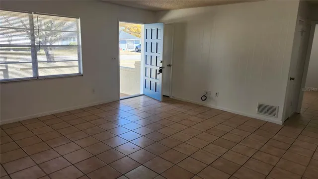 an empty room with windows