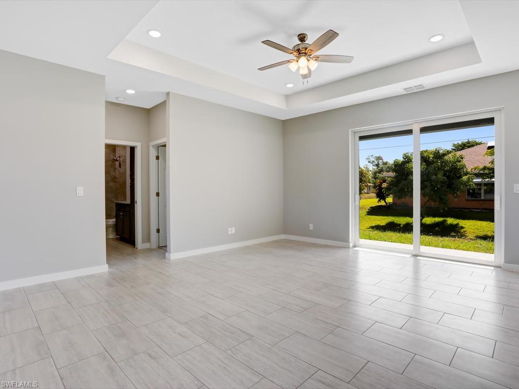 17385 Connecticut Road Fort Myers, FL 33967 - Photo 11 of 31 a view of an empty room with a window